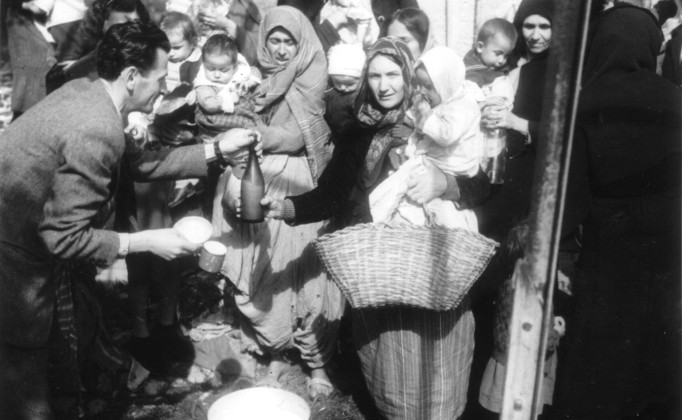 Rations of milk are distributed as aid from Ireland in Albania, 1947. Source: National Archives. 