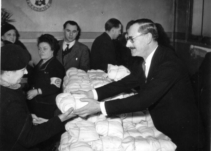 Irish Ambassador to France, Sean Murphy, distributed aid in France, 1947. Source: National Archives. 