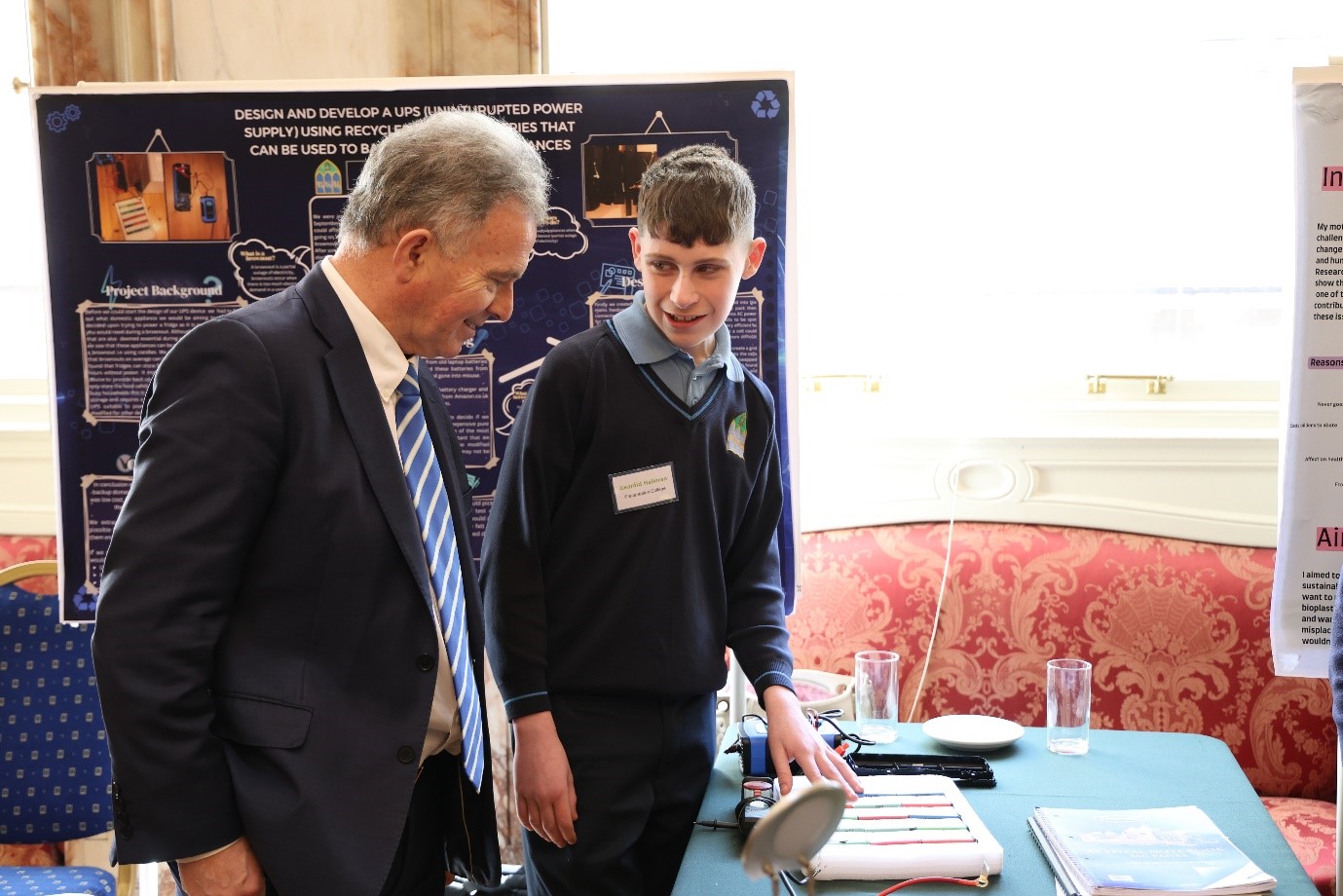 Second year student from Presentation College Galway, Gearóid Halleran discusses his project with Minister Fleming